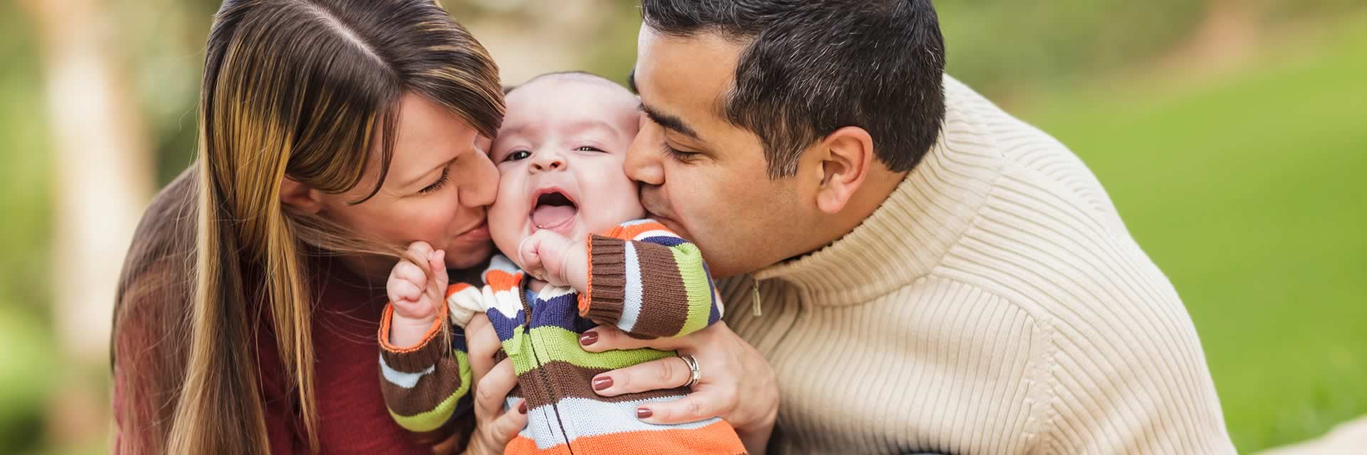 Couple with adopted baby